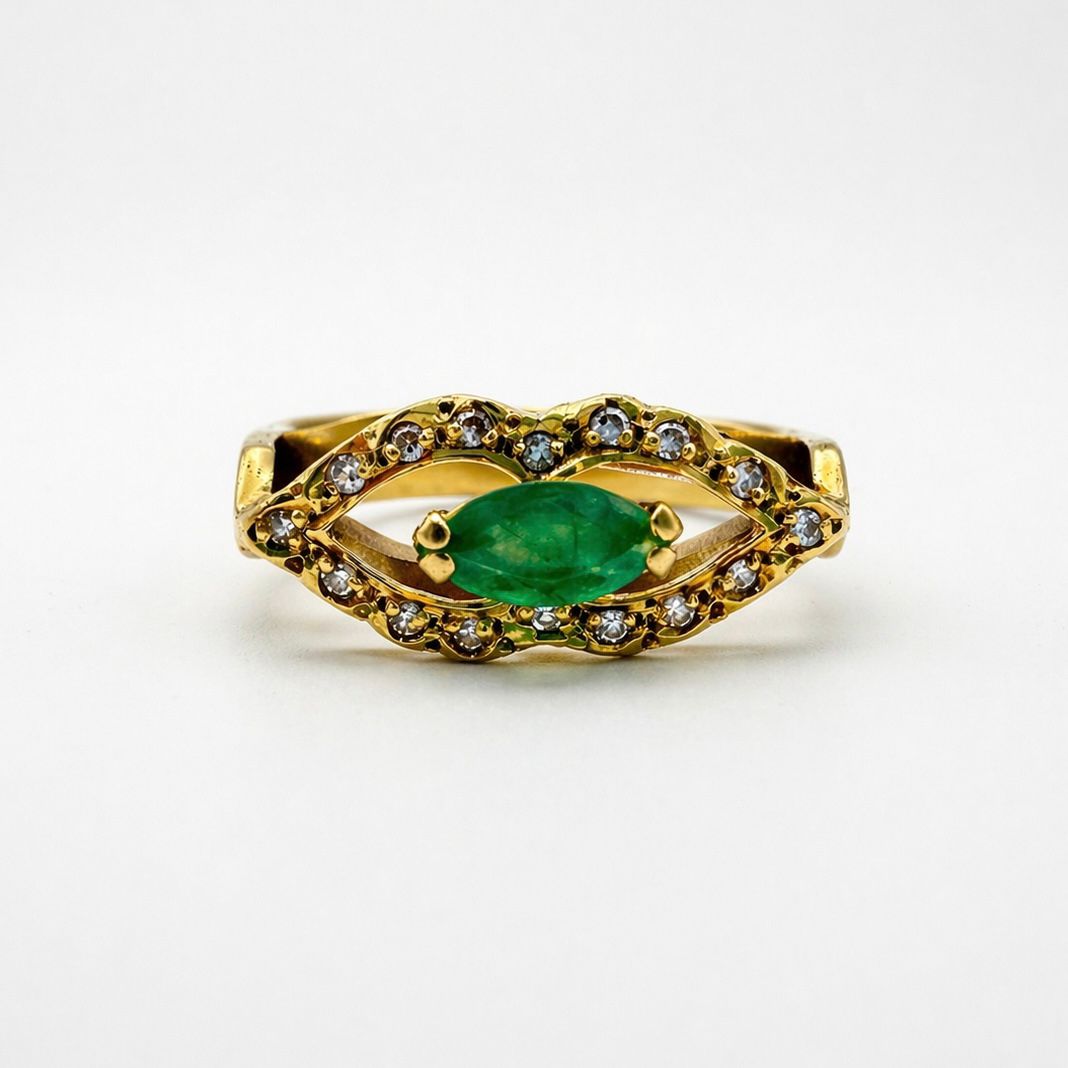 ANILLO DE ORO 18K CON ESMERALDA Y BRILLANTES CORTE MARQUISE