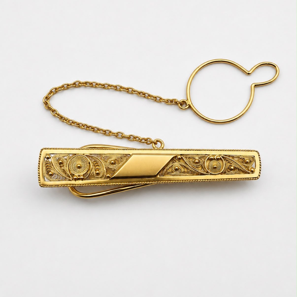PORTACORBATAS FILIGRANA DE ORO 18K