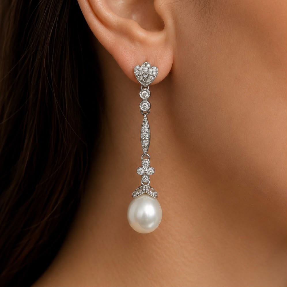 AROS COLGANTES CON PERLAS NATURALES EN ORO BLANCO 18K