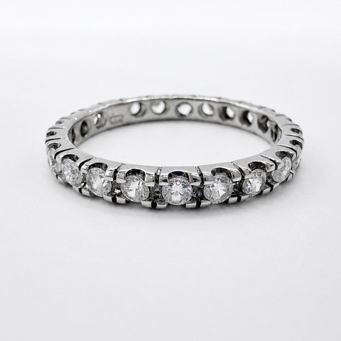 ANILLO TIPO SIN FIN EN ORO BLANCO 18K