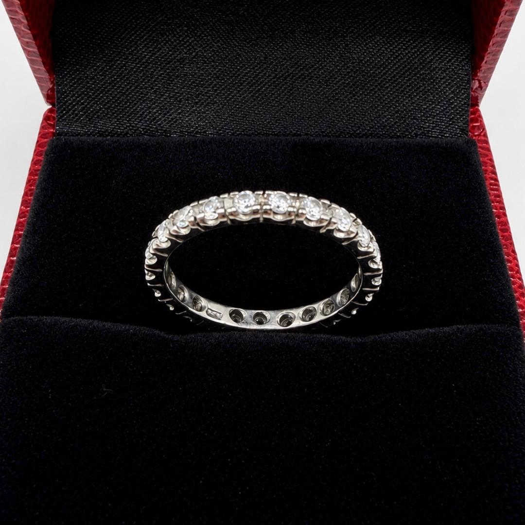 ANILLO TIPO SIN FIN EN ORO BLANCO 18K