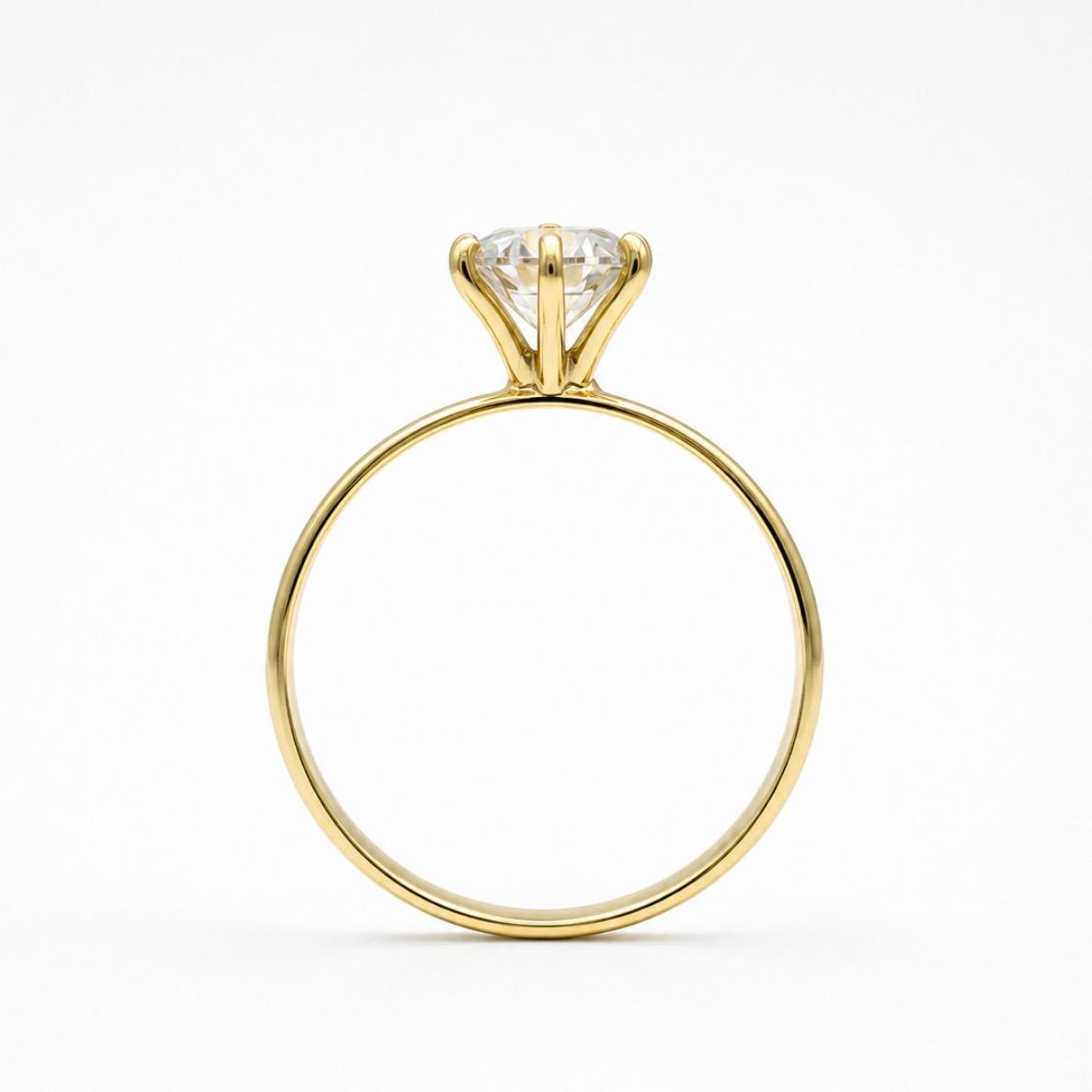 ANILLO SOLITARIO EN ORO 18K CON CIRCÓN