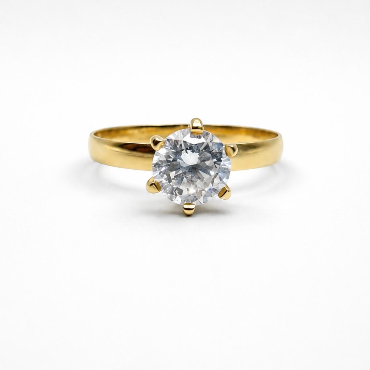 ANILLO SOLITARIO EN ORO 18K CON CIRCÓN