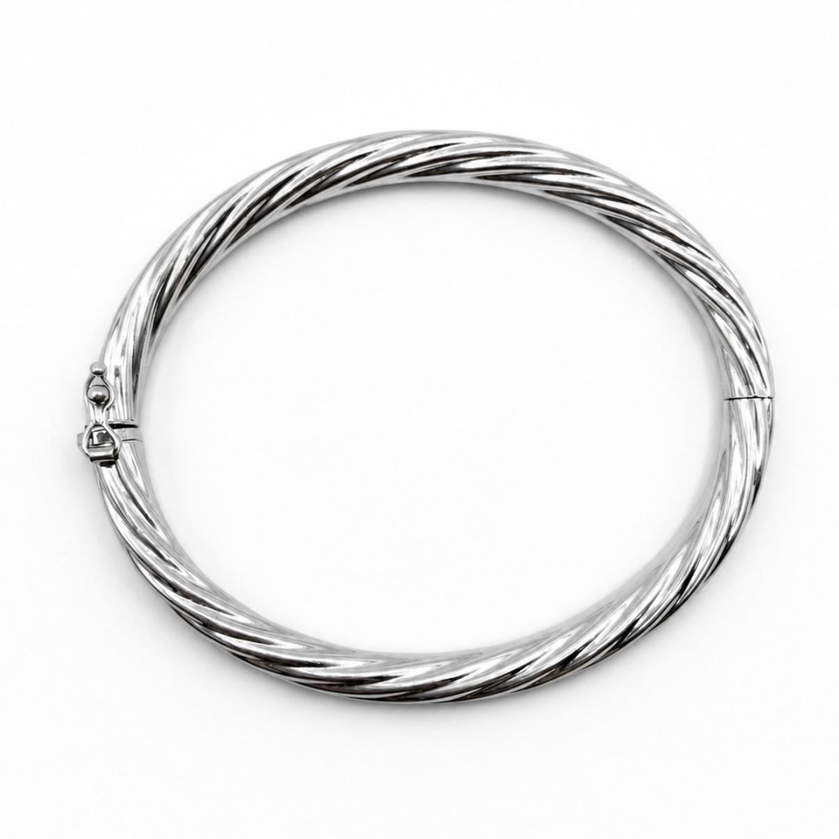 PULSERA ESCLAVA TORSIONADA EN ORO BLANCO 18K