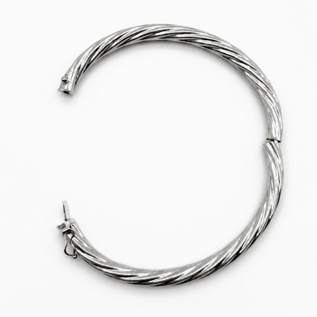 PULSERA ESCLAVA TORSIONADA EN ORO BLANCO 18K