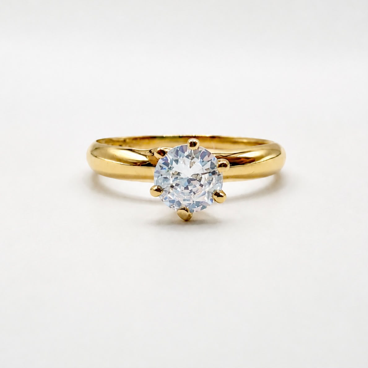 ANILLO SOLITARIO EN ORO 18K CON CIRCÓN
