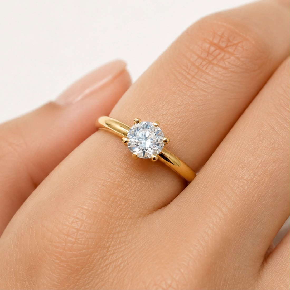 ANILLO SOLITARIO EN ORO 18K CON CIRCÓN