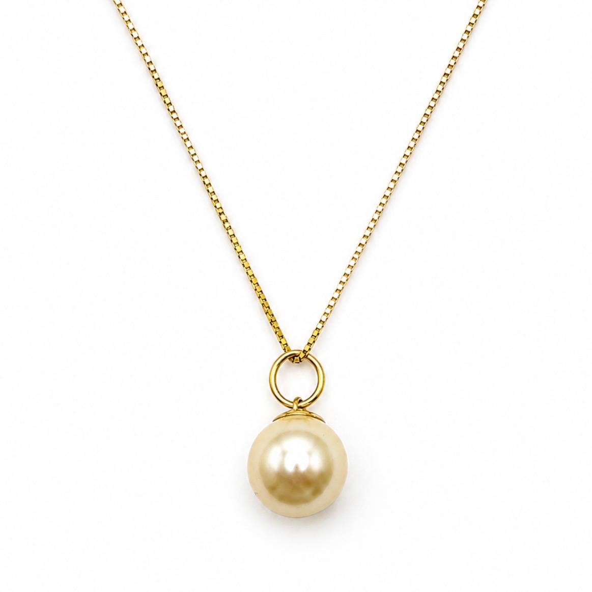 CONJUNTO EN ORO 18K CON PERLA