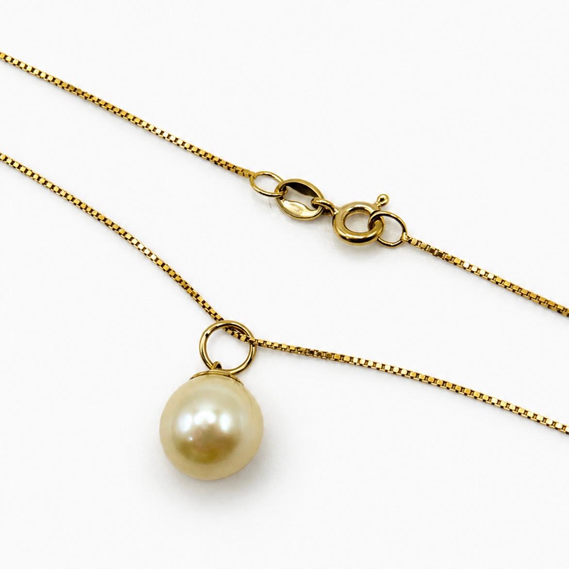 CONJUNTO EN ORO 18K CON PERLA
