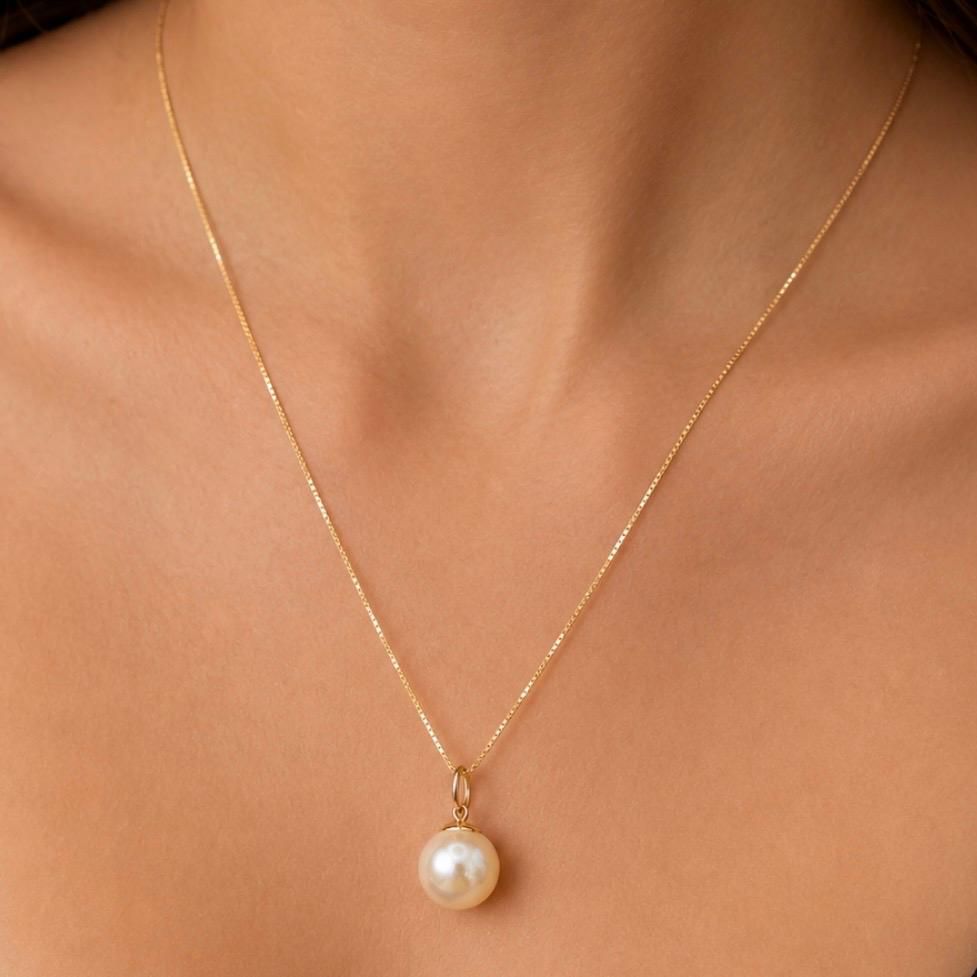 CONJUNTO EN ORO 18K CON PERLA