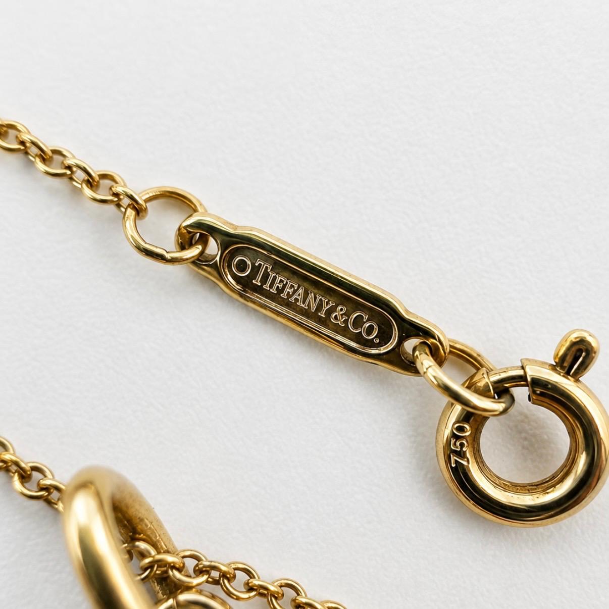 COLLAR TIFFANY & CO. TREFOIL KEY EN ORO 18K